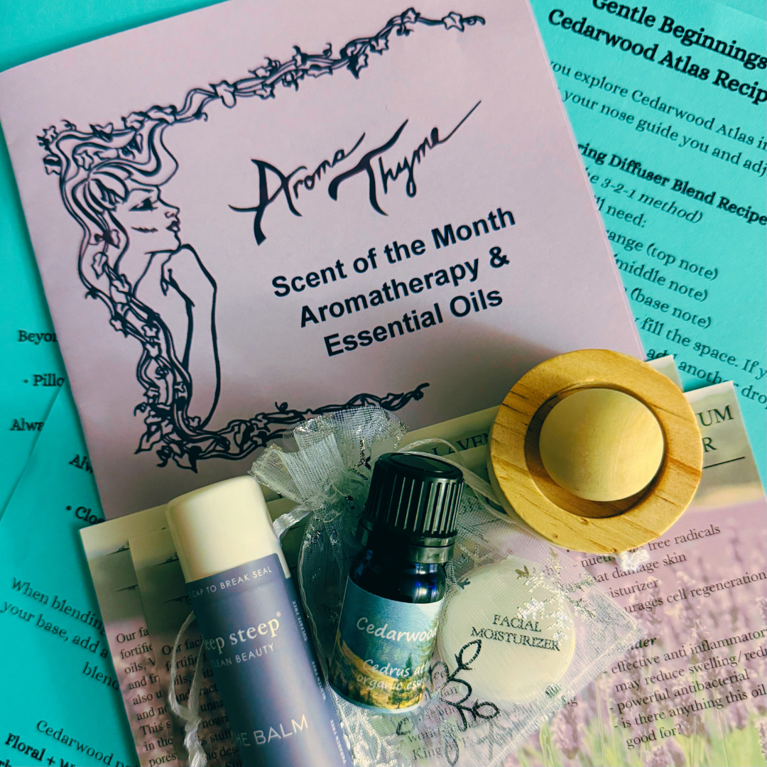 Aromatherapy products including a essential oil bottle, balm, and facial moisturizer on a magazine background with Aroma Thyme branding.